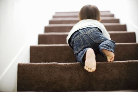 Safety First as Baby Learns to Climb Stairs
