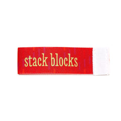 stack blocks Wee Charm ribbon red