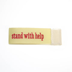 stand with help Wee Charm ribbon ivory